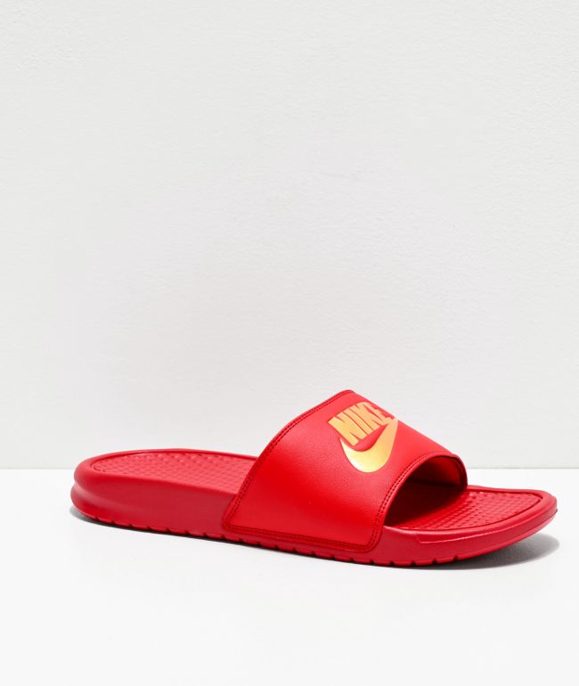maroon nike sandals with gold swoosh